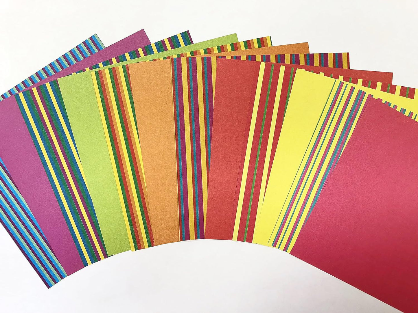 Origami Paper: Stripes and Solids- 300 Sheets, 4in (10 CM), Double-Sided with 12 Different Designs by Tuttle Studio